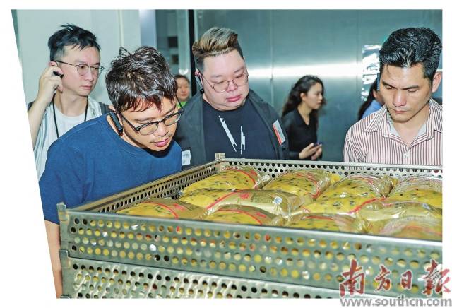 港商参观走访博罗农企加工车间，调研企业加工生产工艺。受访者供图